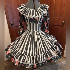 Square dancers or Cloggers! Beautiful black/white striped dress w/floral accent.